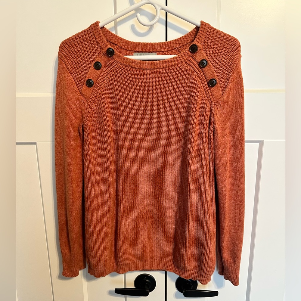 Cable stitch sweater.